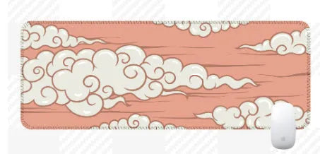 Large rectangular cloud pattern mouse pad and desk mat in natural rubber on a wooden desk.
