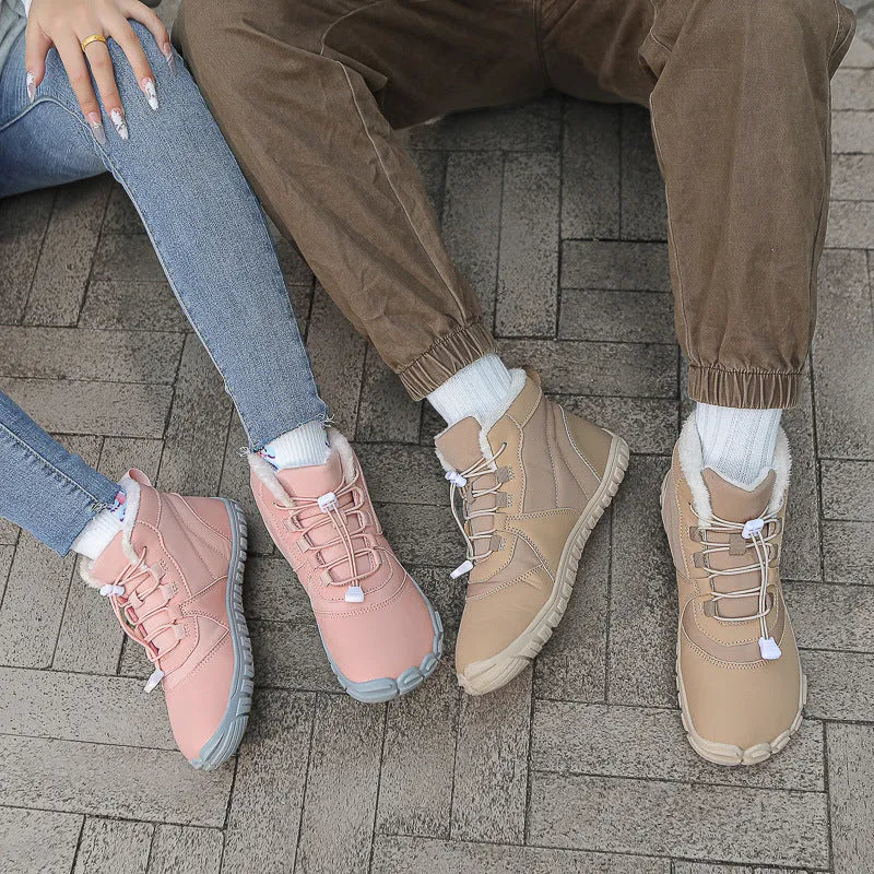Outdoor snow boots in black, khaki, or pink with lace-up front and rubber sole