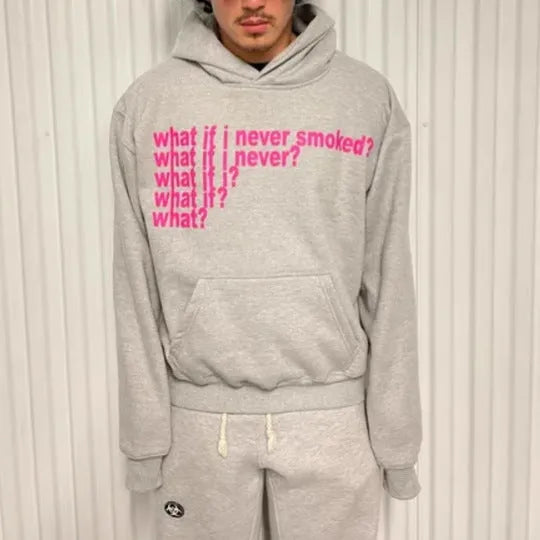 Black hooded sweater with white letter print design, modelled on person