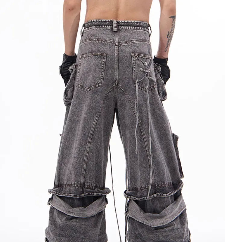 Grey distressed cotton denim men's overalls with rope stitching on the legs.