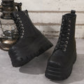 Women's white retro platform Martin boots with patchwork design and side zip.