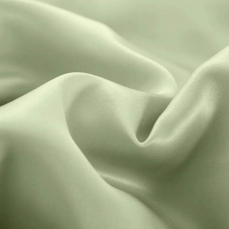 Double-sided solid colour silk duvet cover in Lotus Pink, pea green, bright brown, mysterious purple, white or silver blue.