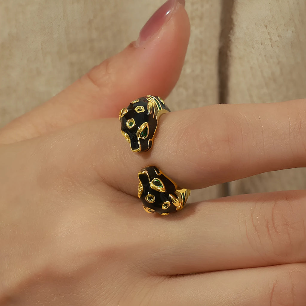 Black cheetah print geometric open ring on finger showing electroplated copper construction