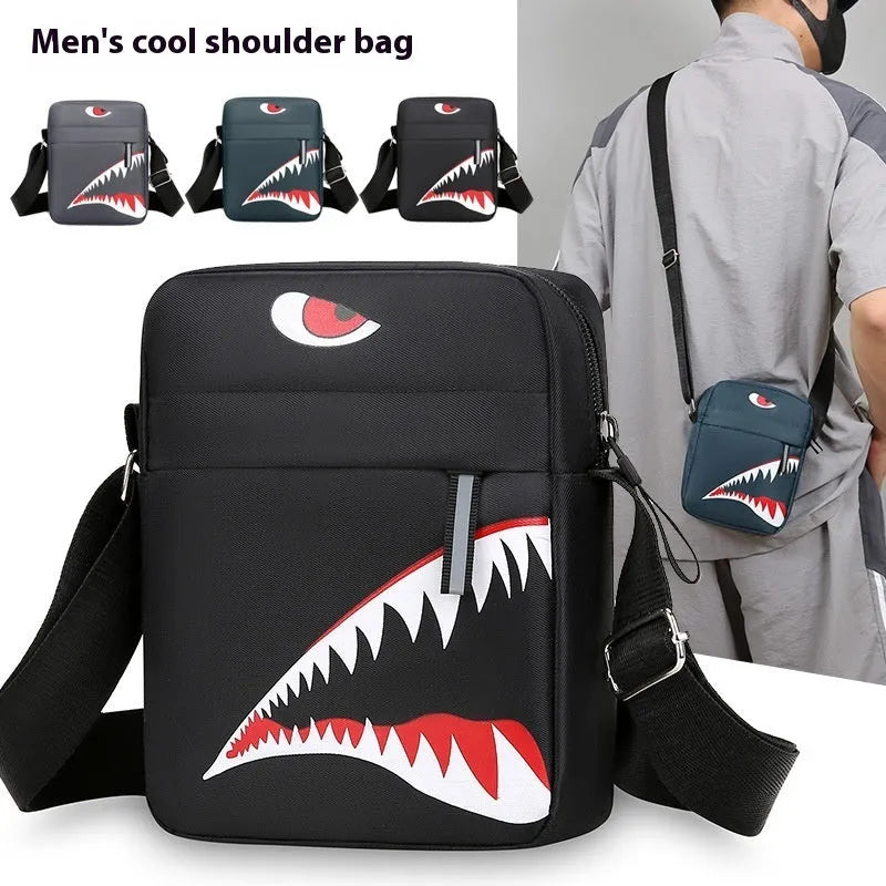 Men's small black Oxford cloth crossbody bag with an animal print pattern.