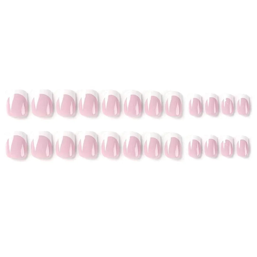 24 white square fake nails with a black and white plaid pattern design laid out on a surface.