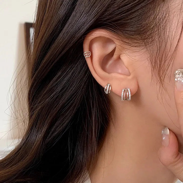 925 silver geometry earrings with electroplated finish shown in three available sizes