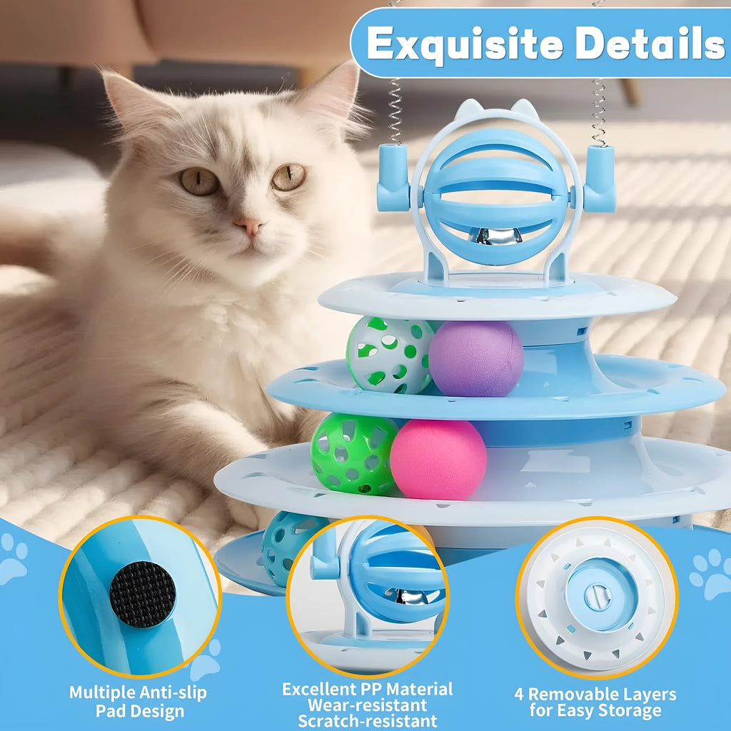 Blue four-tier interactive cat puzzle toy with rolling balls and teaser rods on a table.