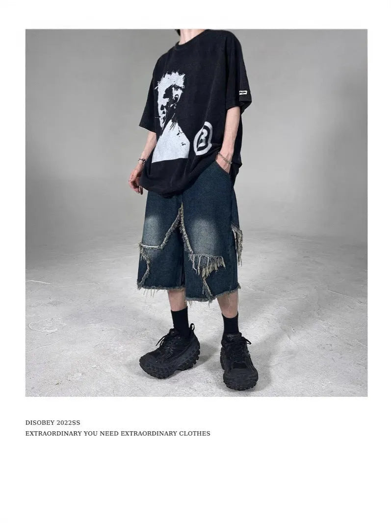Blue denim shorts with frayed details and five-pointed star design, loose fit summer shorts