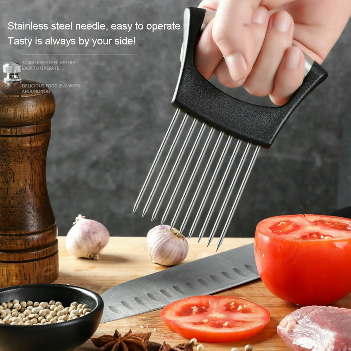 Stainless steel and plastic food slicer holder for onions and tomatoes on a kitchen worktop
