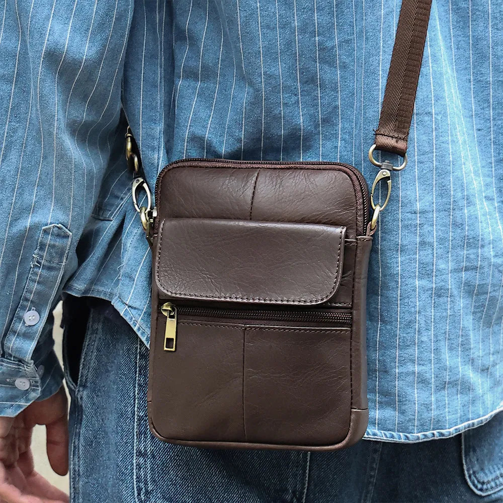 Men's brown leather crossbody shoulder bag with sewing line detailing and shoulder strap