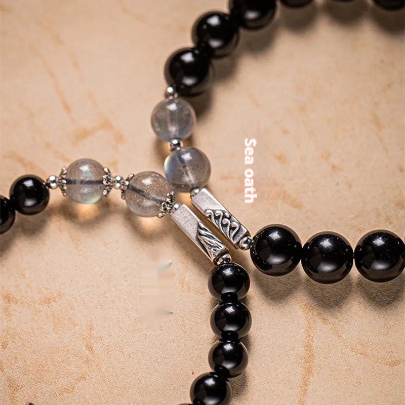 Black obsidian couple bracelet DIY set with 10mm and 8mm beads and adjustable string.