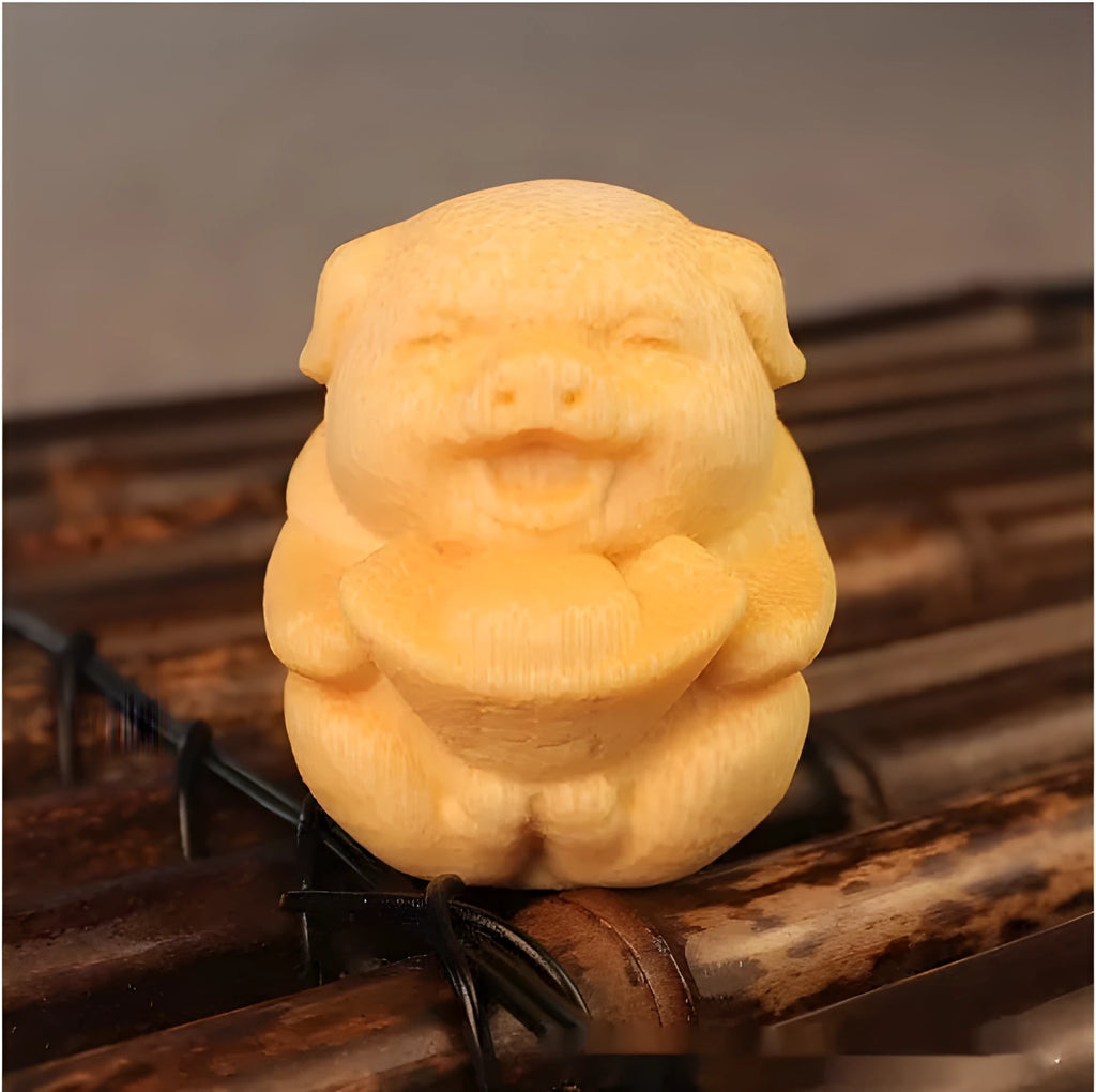 Small solid bamboo carving ornament in the shape of a cute pig ingot, 4cm height, natural wood colour