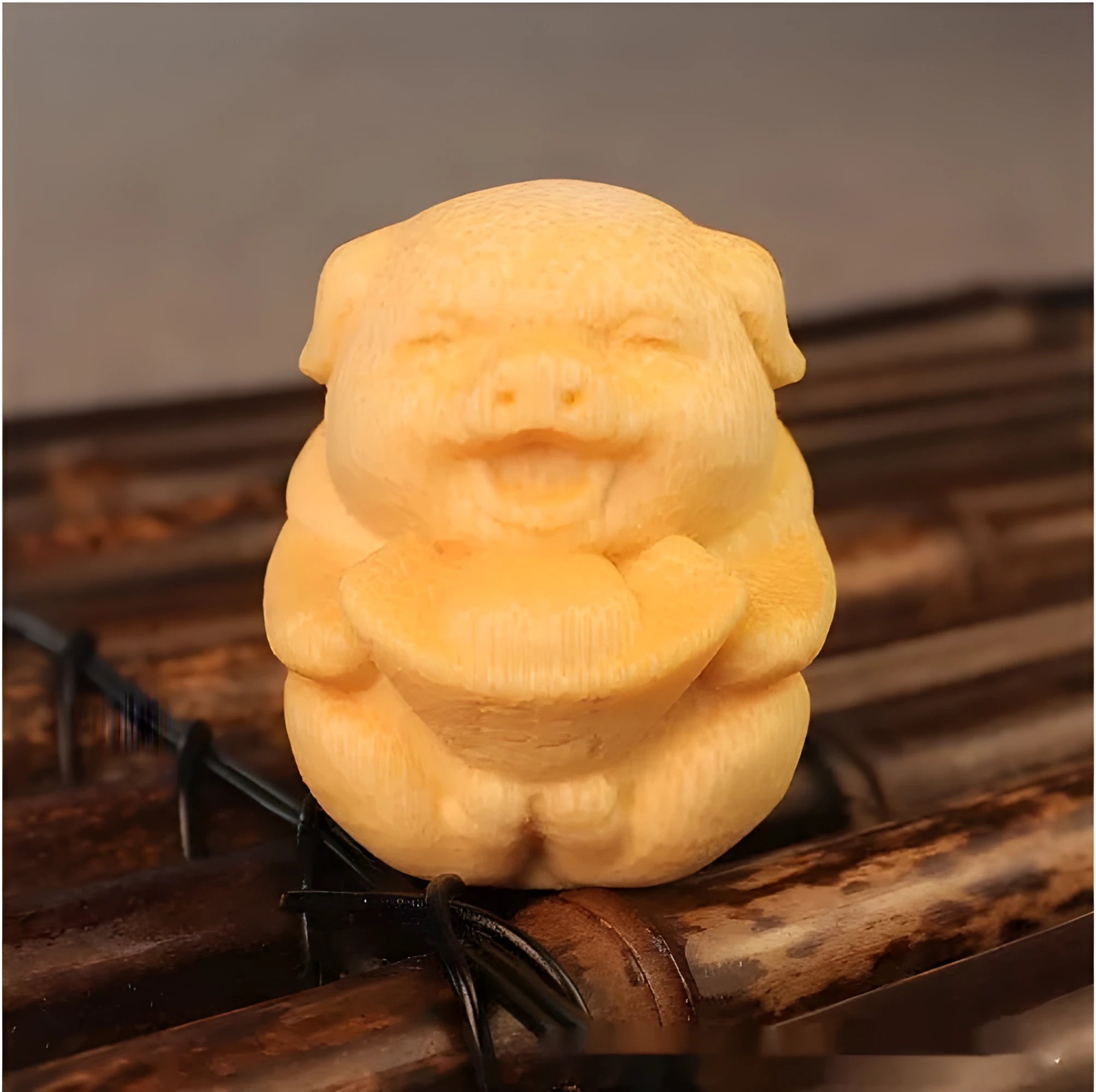 Small solid bamboo carving ornament in the shape of a cute pig ingot, 4cm height, natural wood colour