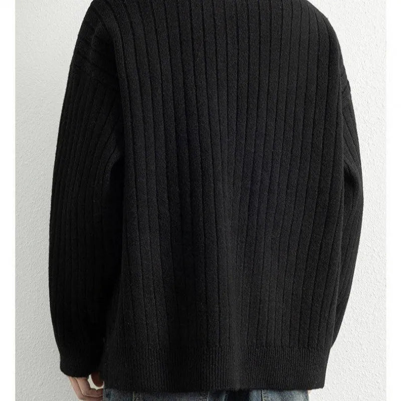 Men's grey half zip textured knit sweater with loose fit and long sleeves
