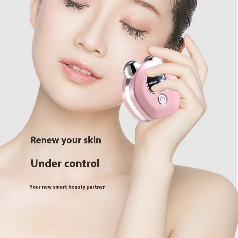 Portable white micro current facial massage instrument with two silver rollers and a USB charging cable