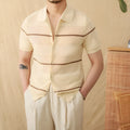 Camel coloured lapel collar short sleeve knitted cardigan on a hanger