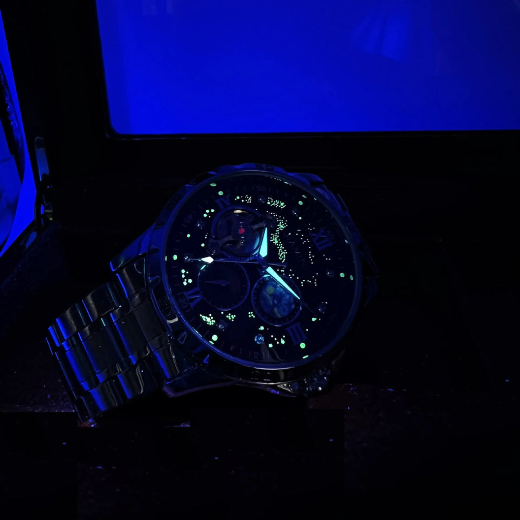 Men's automatic mechanical watch with rose gold shell case and black dial face showing 12mm thickness