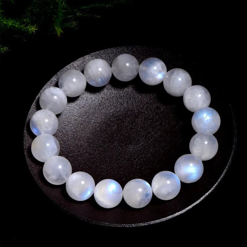 Natural blue moonlight round bead moonstone bracelet with polished finish and geometric bead shape