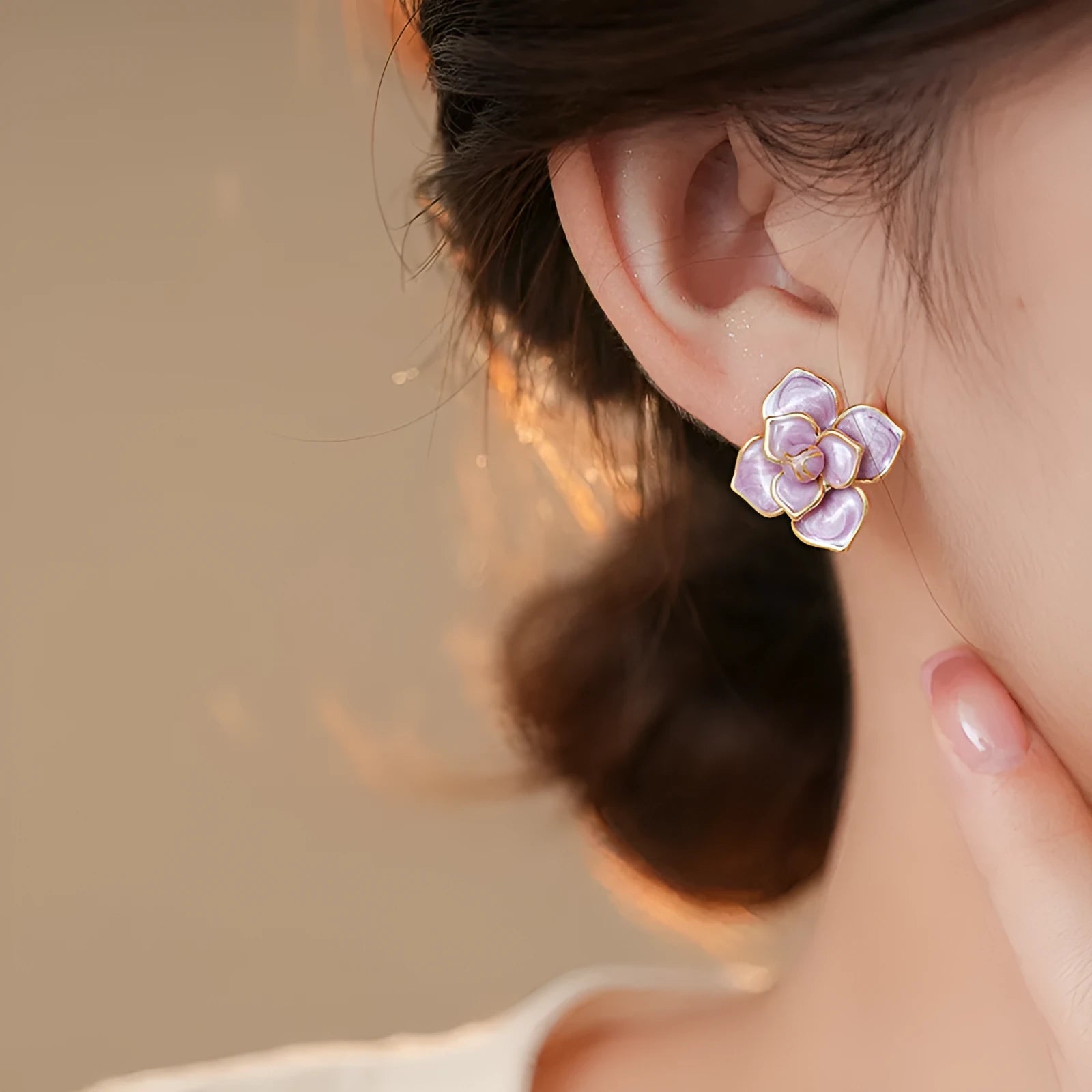 Gold plated purple floral stud earrings with oil-spot glaze colour variation on copper