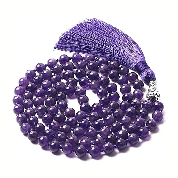 Long beaded agate necklace with geometric stones and a tassel, showing colourful variations.