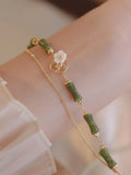 Handmade natural olivine bracelet with double layer twin bells design and olive branch pastoral details
