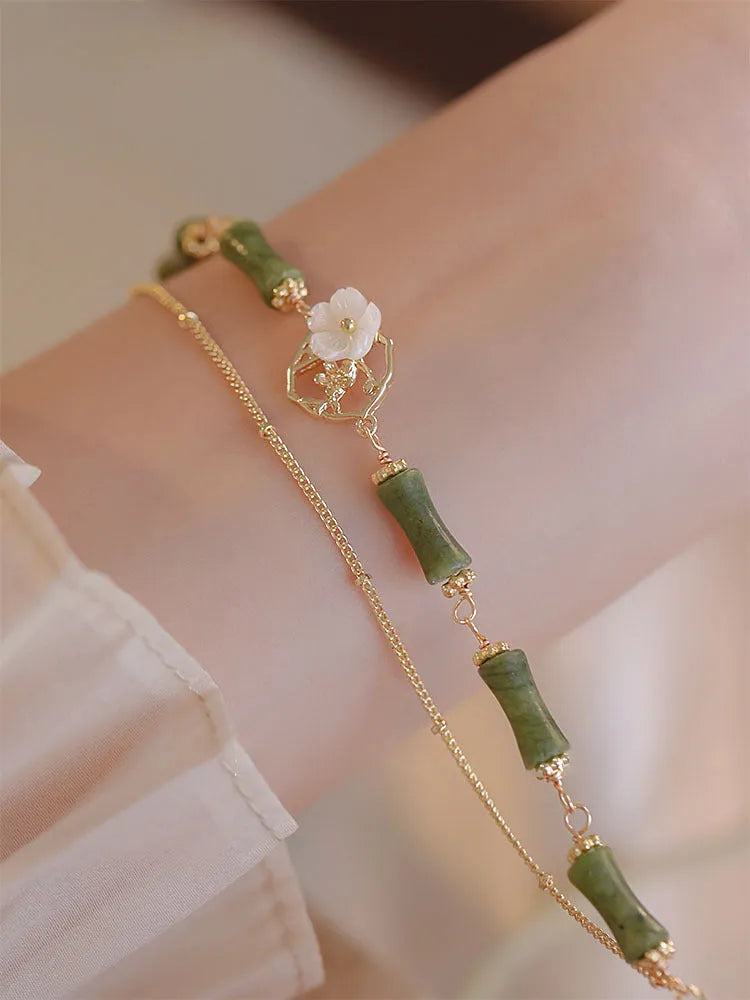 Handmade natural olivine bracelet with double layer twin bells design and olive branch pastoral details