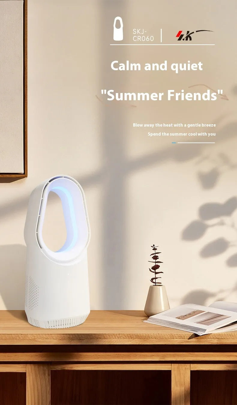 White bladeless tower floor fan with remote control on a wooden desk.
