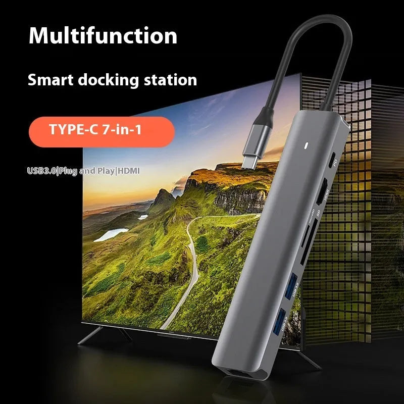 Silver LQT-LH07 7-in-1 USB-C hub and card reader for laptops showing multiple ports.