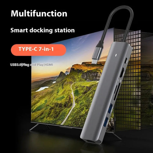 Silver LQT-LH07 7-in-1 USB-C hub and card reader for laptops showing multiple ports.