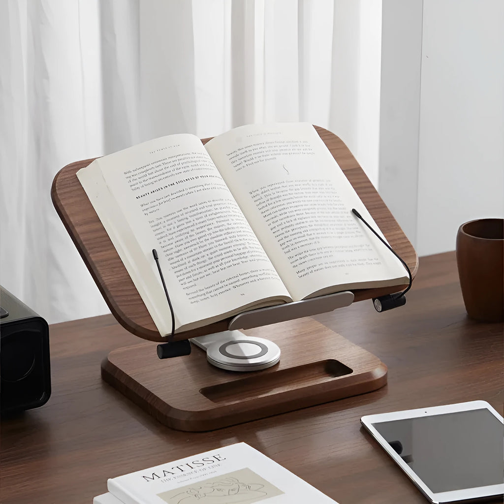 Solid wood reading rack in walnut colour with adjustable rotating mechanism holding a book