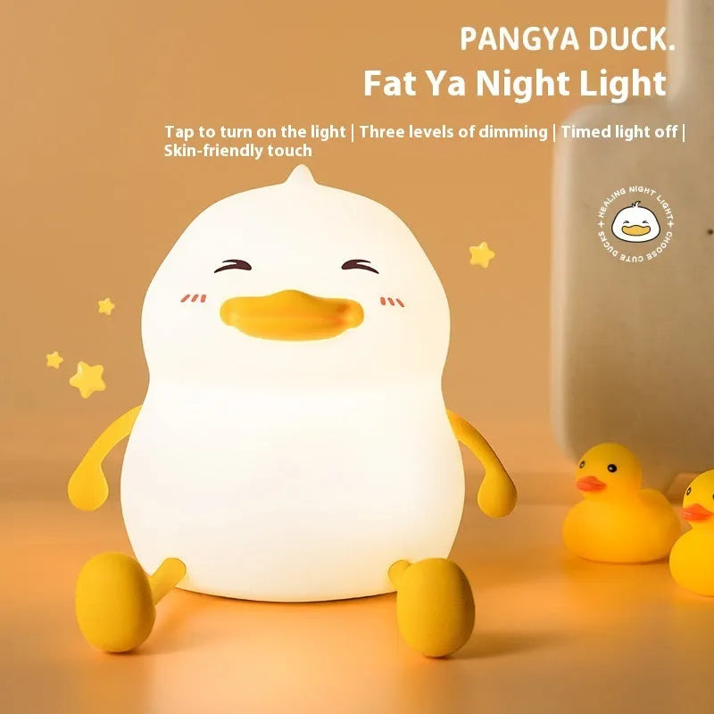 Chubby silicone pet night light desk lamp with integrated phone holder showing dimensions 108x104x128mm
