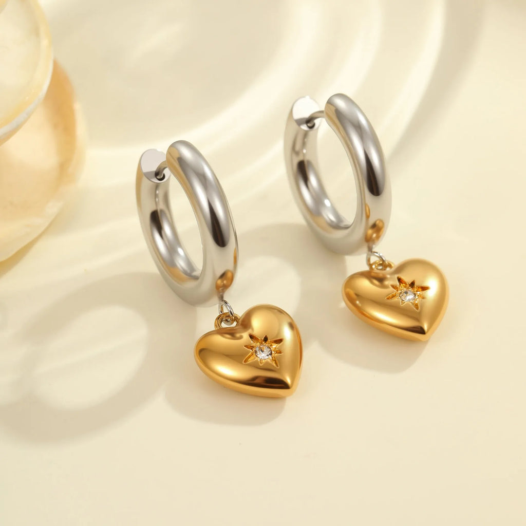 Christmas tree heart earrings in stainless steel with 18K gold plating showing heart and star shapes