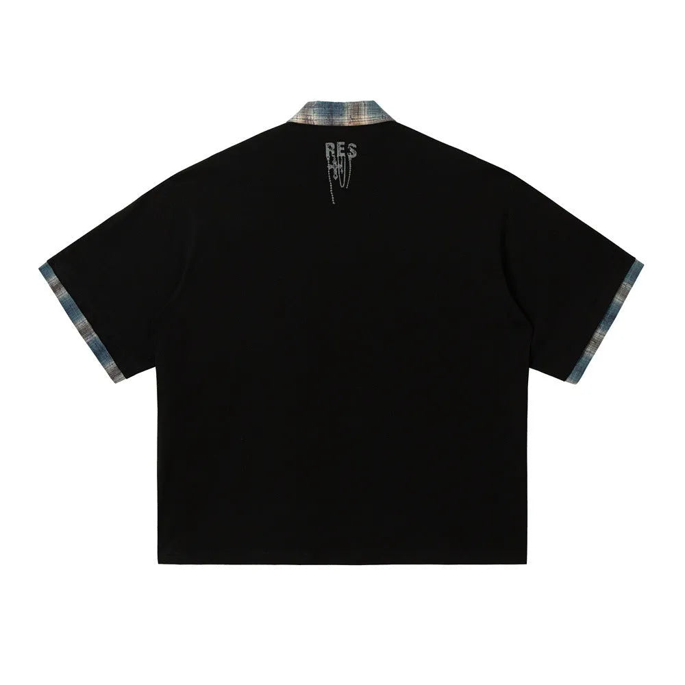Men's loose asymmetric short-sleeved cotton top with graffiti print in blue.