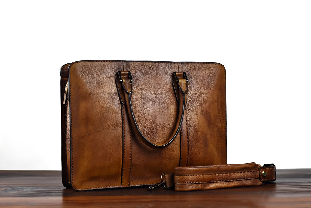 Men's horizontal leather handbag in black or khaki with zipper closure and 14 inch width