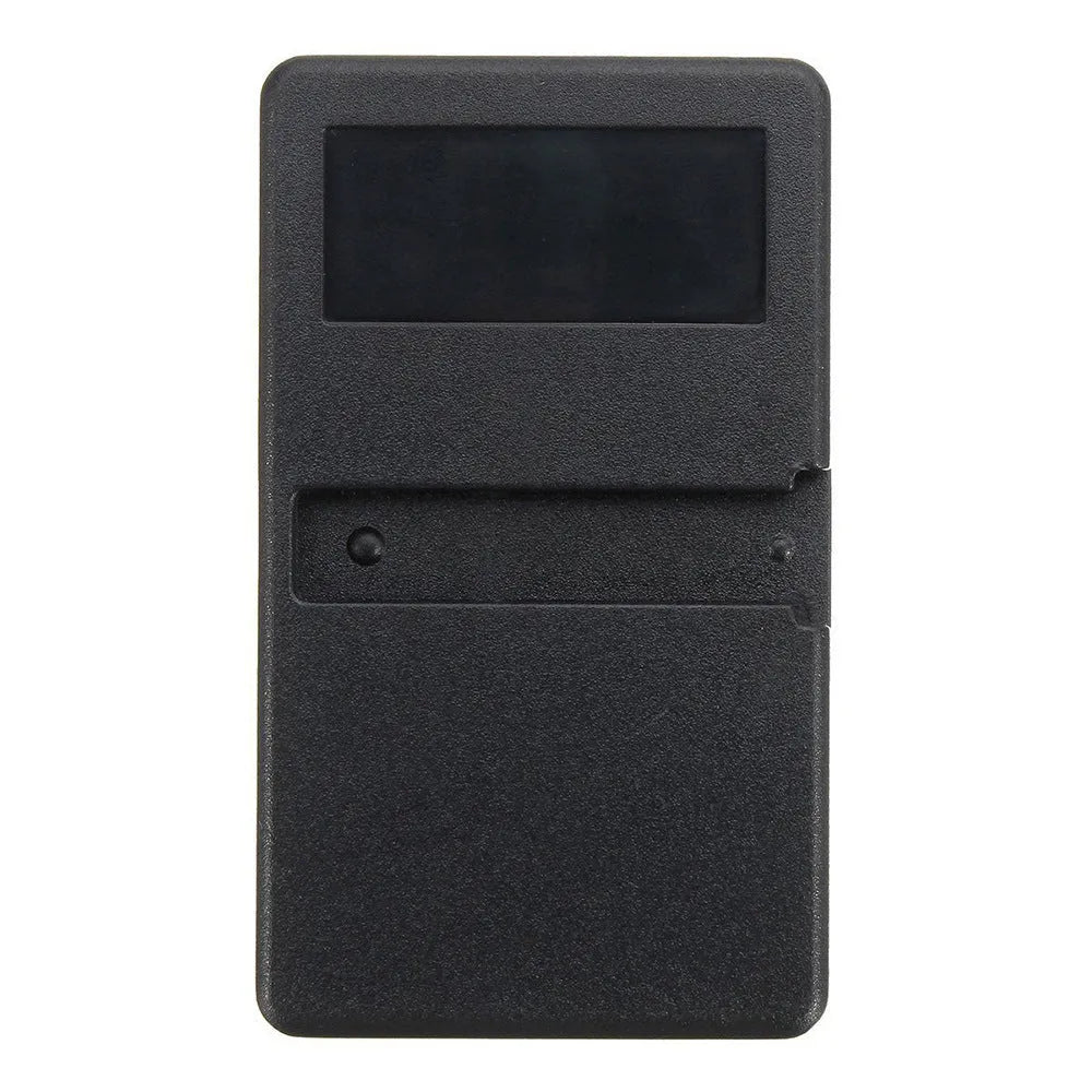 Black three-button garage door remote control with 390 MHz frequency.