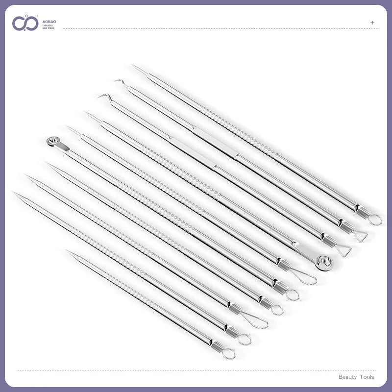 Four silver metal acne needles and a handling clip laid out on a clean surface.