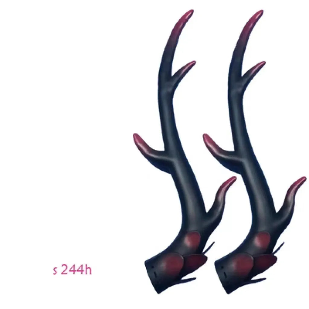 Pair of detailed resin dragon horns for motorcycle helmet customisation in Black Gold finish.