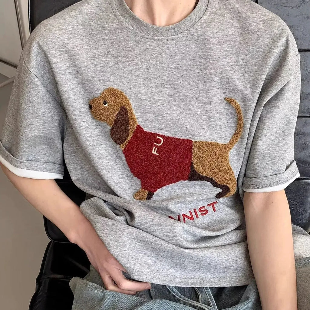 Mens grey cotton T-shirt with embroidered sausage dog towel design on front.
