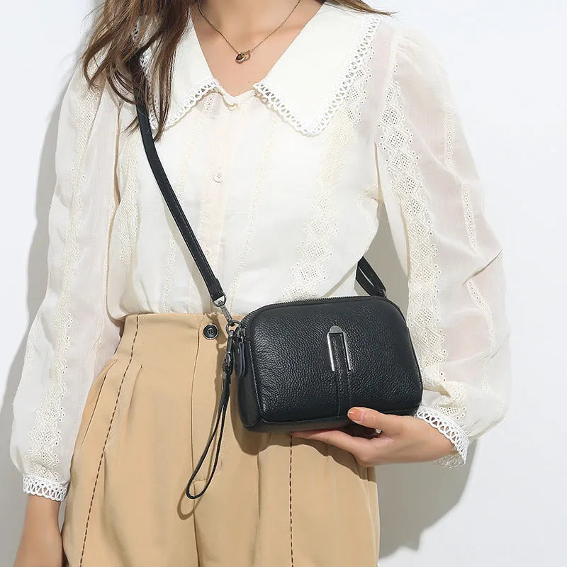 Genuine leather women's square shoulder bag in black, shown with dimensions 19x13x6 cm.