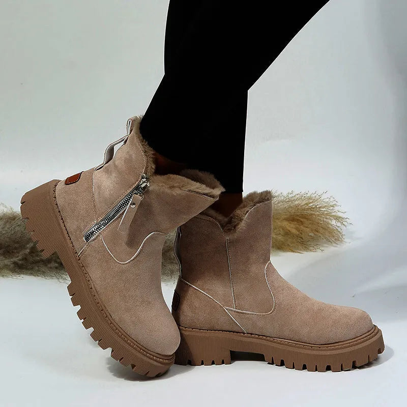 Women's black thick plush high-top snow boots with a side zipper and non-slip sole.