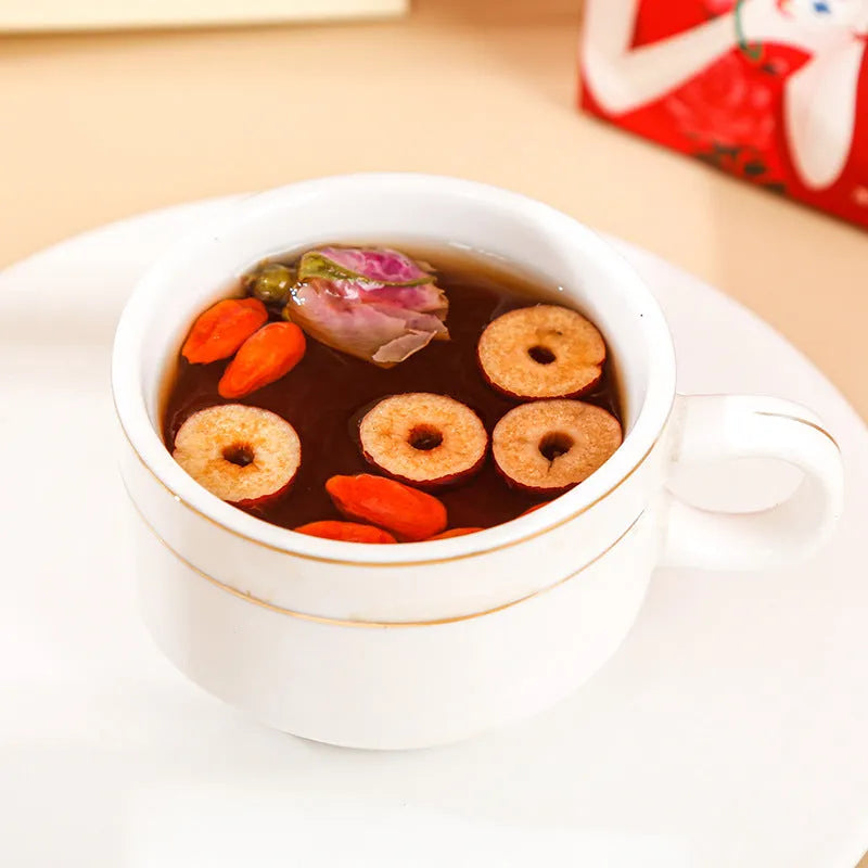 Box of Yuantang ginger jujube tea with 150g weight containing herbal tea bags