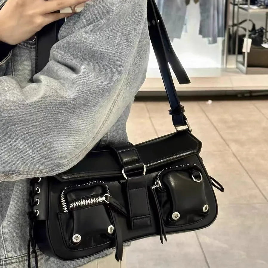 Black structured PU leather women's messenger bag with an adjustable shoulder strap.