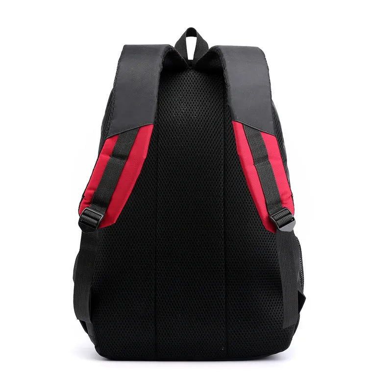 Waterproof nylon school backpack in grey with airpillow straps and contrast stitching.