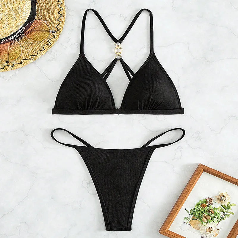 Black women's hollow backless triangle bikini top with high-cut split-side swim briefs