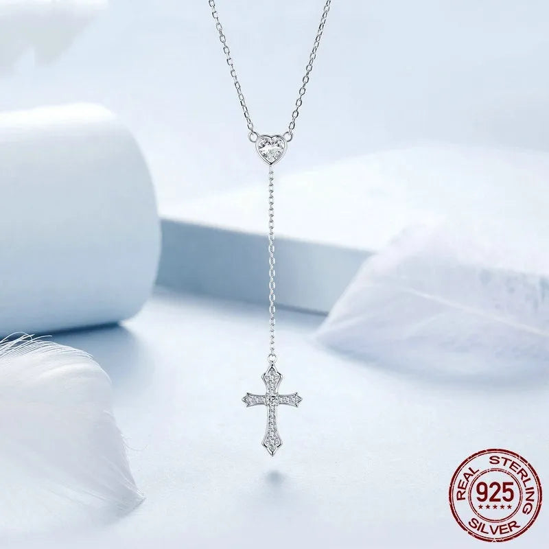 Silver necklace with V-neck cross pendant on O-ring chain in colour BSN384