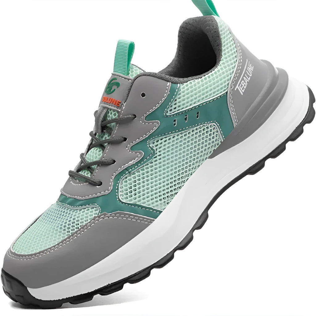 Green low-top work shoes with mesh panels, plastic steel toe cap, and slip-on design.