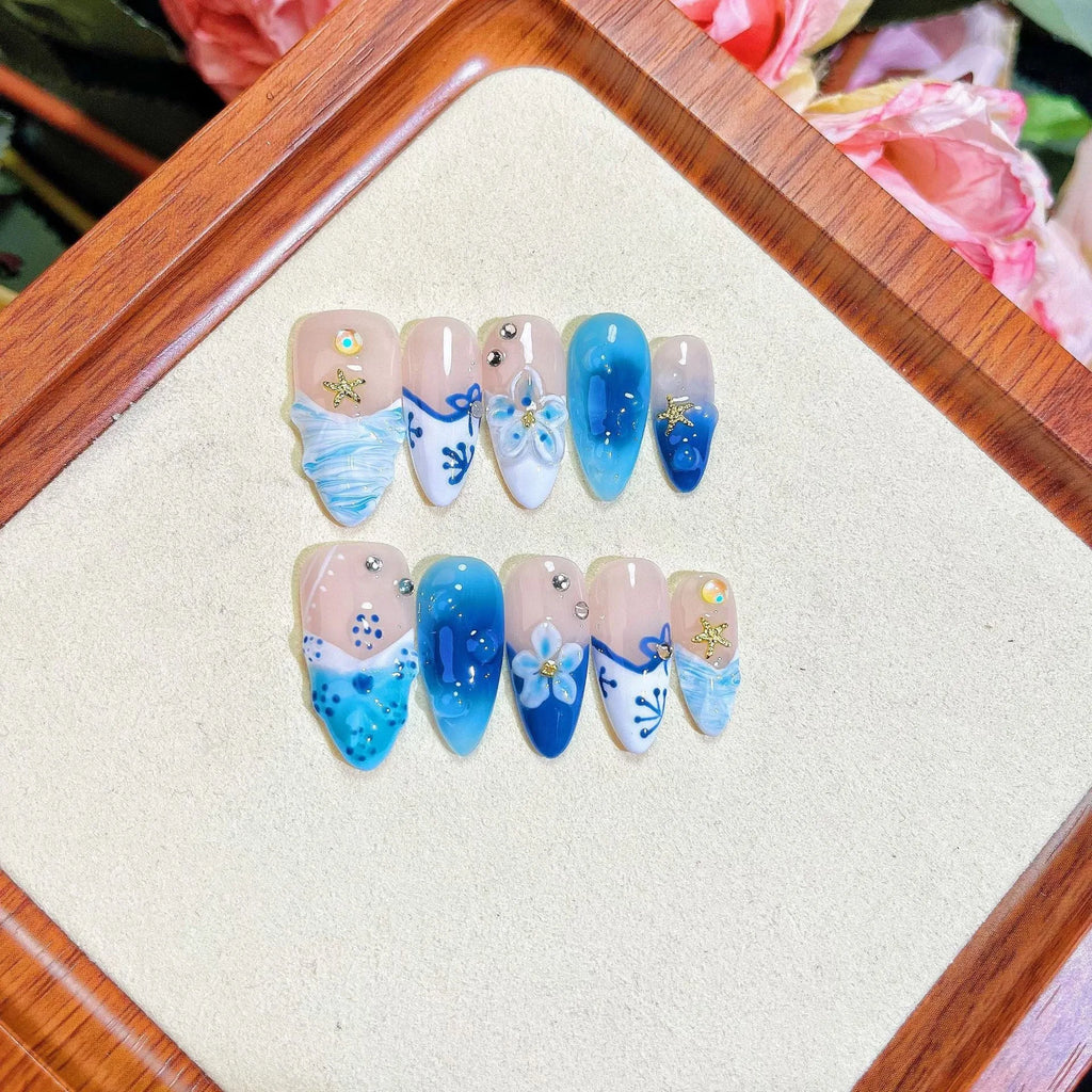 Blue hand-painted carved transparent ice fake nails in plastic material for women