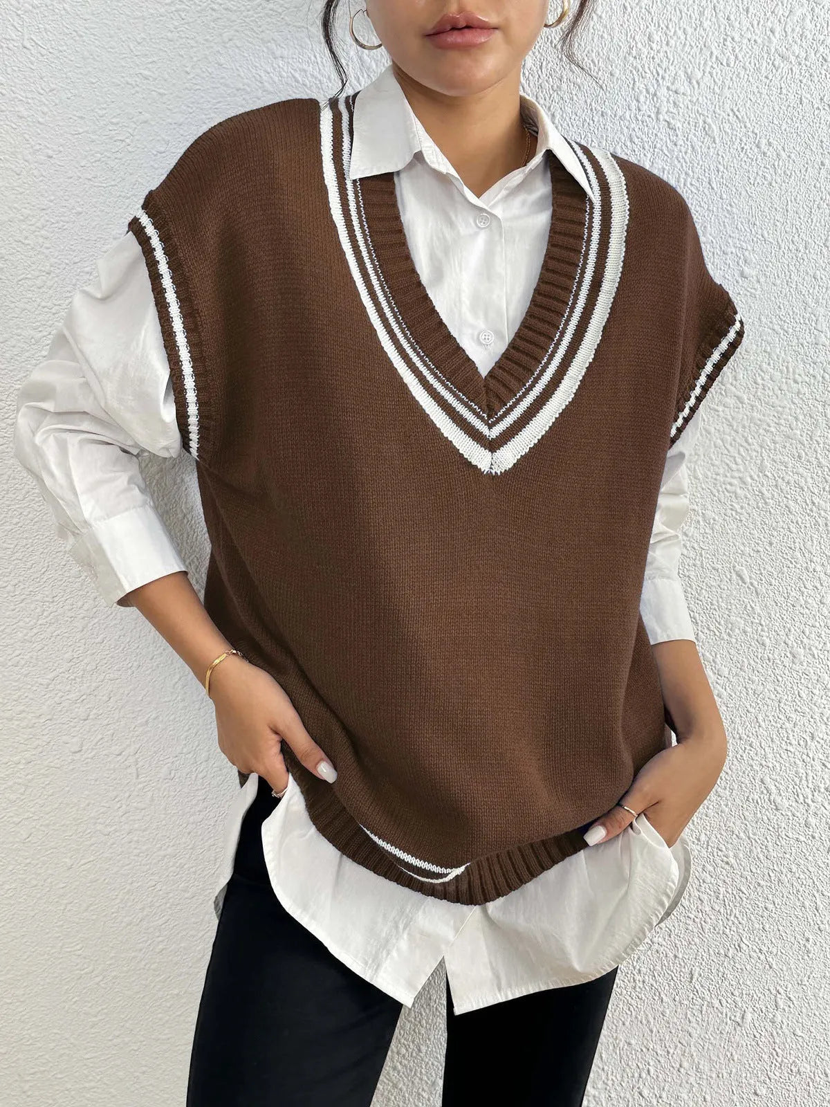 Blue loose women's wool vest sweater with a casual pullover design.