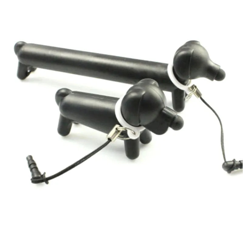 Black dog-shaped touch screen stylus showing dual-length design and phone holder function