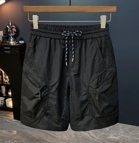 Men's camouflage cargo shorts in a loose fit with cargo pockets and elastic waist.